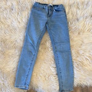 Levi light blue skinny jeans with elastic around waist